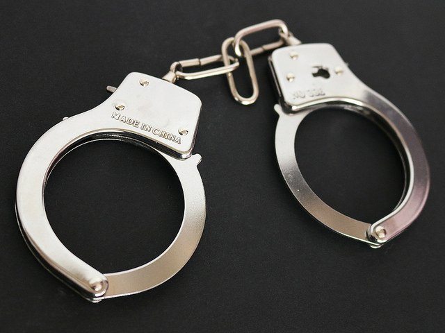 Handcuffs (picture credit www.JobsForFelonsHub.com via Flickr).jpg