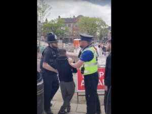 Police arresting cyclist in Stafford