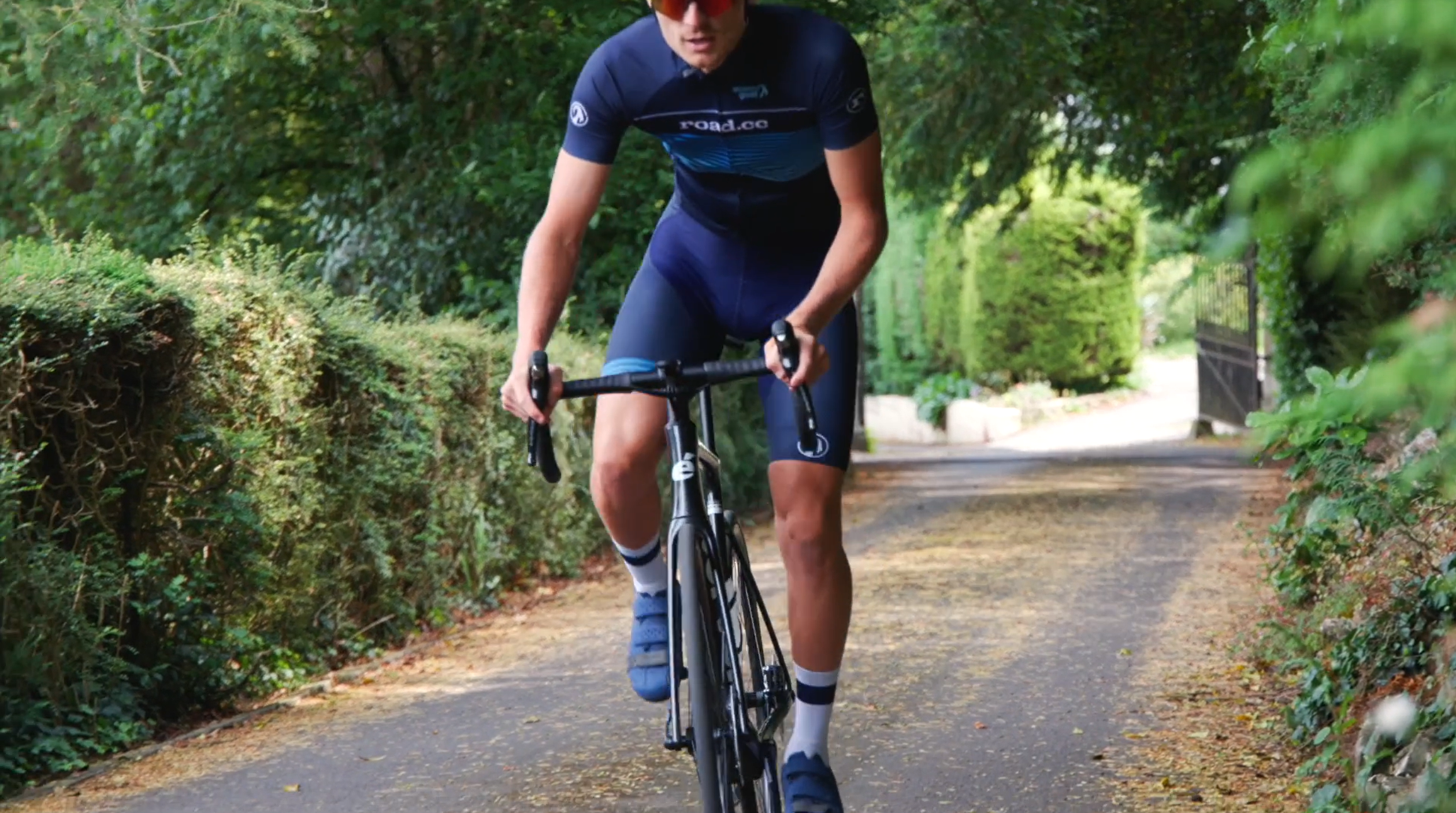 2023 cervelo soloist riding shot out the saddle uphill climbing