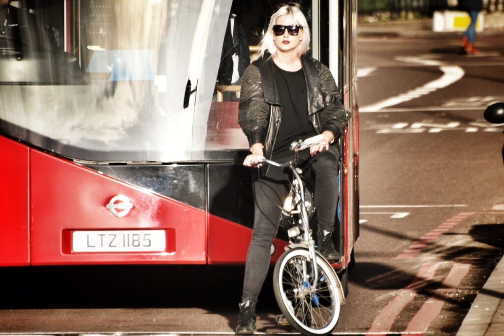 Cyclist and bus in London (copyright Simon MacMichael)