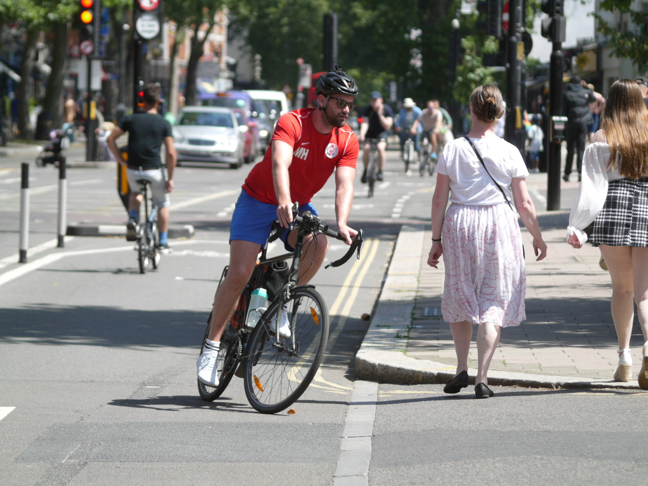 London cyclist turning (copyright Simon MacMichael)