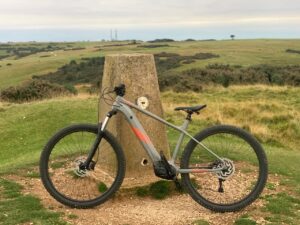 Cannondale Trail Neo S2 atop hill