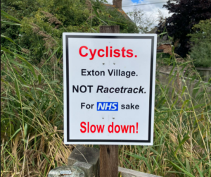 Sign in Exton Village warning cyclists to ‘slow down for NHS sake’ (Tom Jones, Twitter)