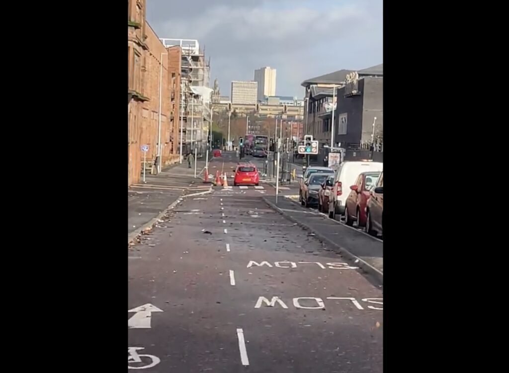 Driver in cycle lane, Glasgow