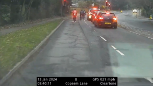 Surrey Police video of cyclists stopped for ignoring red light (@SurreyRS)