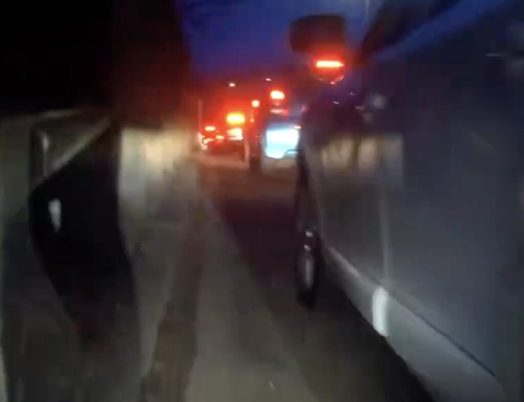 Cyclist filtering through traffic