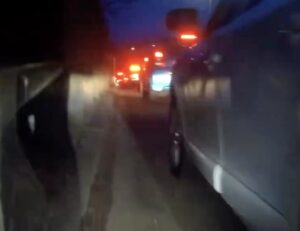 Cyclist filtering through traffic