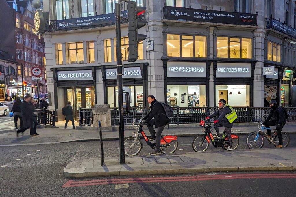 Cyclists in London stopped at red light outside marks and spencer – copyright Simon MacMichael