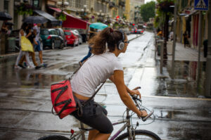 Cyclist with headphones in Nice, France