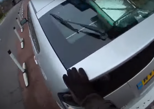 Motorist reverses into cyclist on bike lane