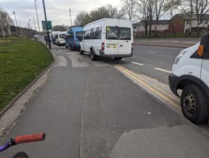 Vehicles blocking cycle lane outside Etihad Stadium on Manchester City matchdays (Martin Degnan)