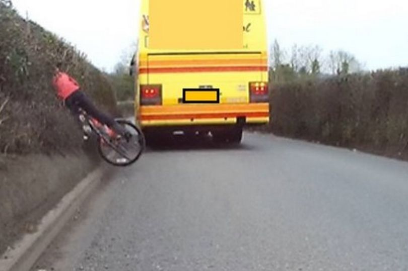 (Avon and Somerset Police) bus driver knocks cyclist into hedge