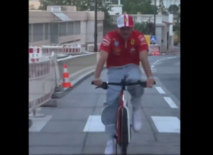 Charles Leclerc riding his bike after winning 2024 Monaco GP