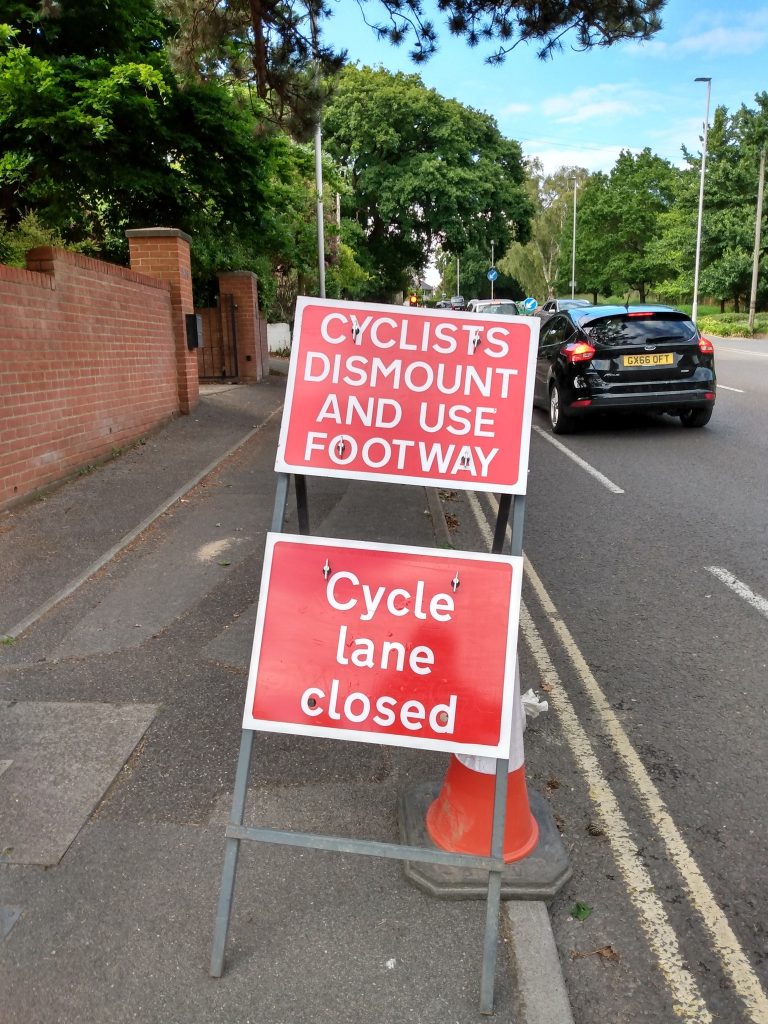 Cyclists Dismount signs, Ringwood Road, Poole (Susan Stockwell)