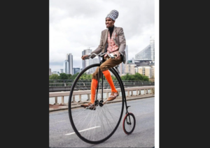 Cyclist helps elderly man.PNG