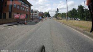 Cyclists Dismount sign on A56 Chester Road, Manchester (Twitter: @kat_1701)