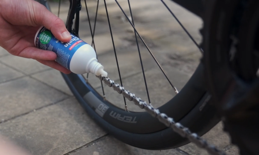 2024 Cycling essentials applying chain lube