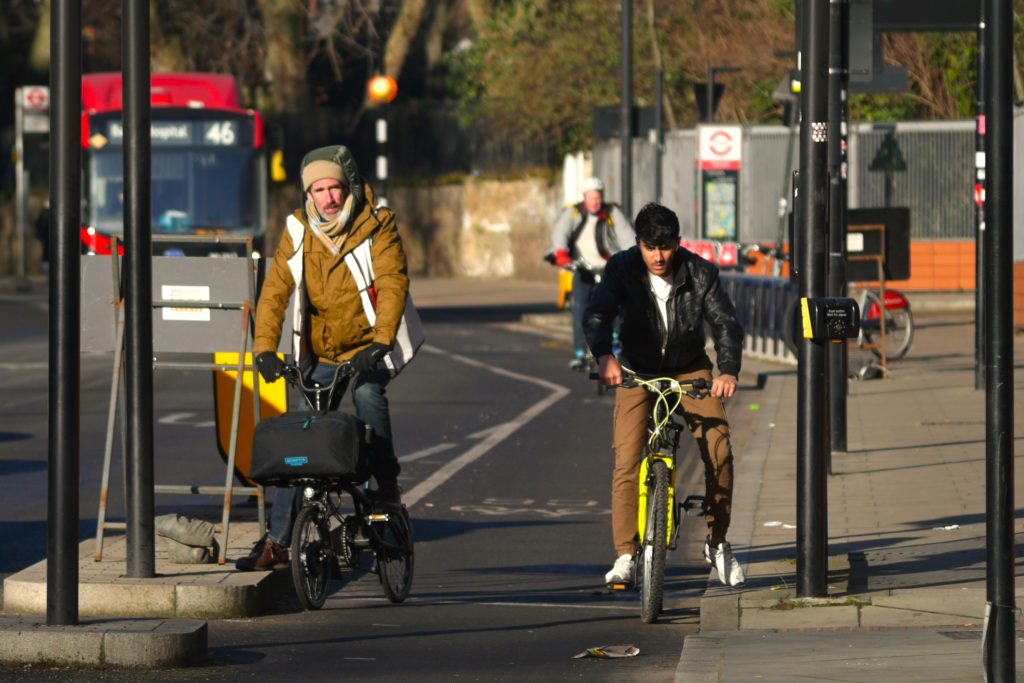 Cyclists in London at traffic lights in cycle lane &ndash; copyright Simon MacMichael