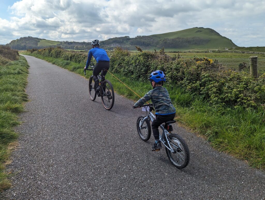 2024 Kommit Bike Towing System Riding.jpg