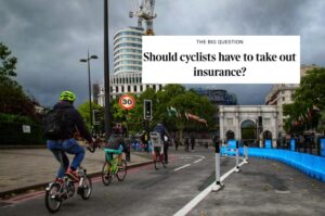 Cyclist at Marble Arch and Times cycle insurance headline