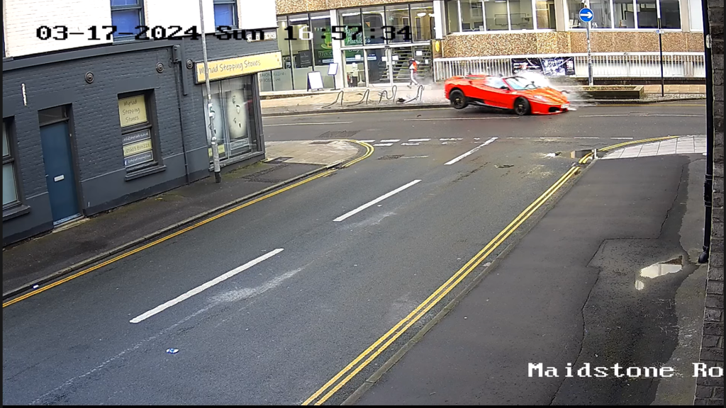 Ferrari driver destroys bike rack (YouTube/Conisford Court)