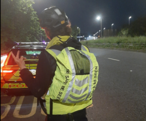 Police stop cyclist at night during long-distance ride to give him hi-vis vest and bag (Northern Ireland Road Policing and Safety unit)