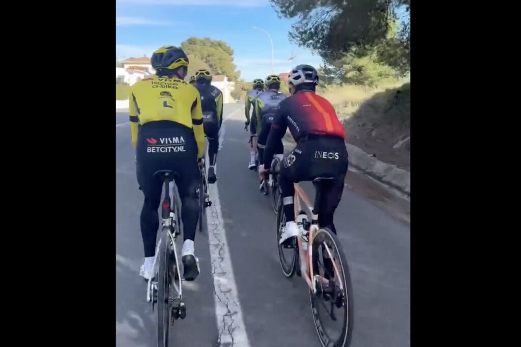 Tom Pidcock riding with Q36.5 teammates in Ineos kit