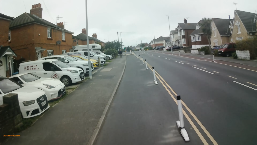 Wimborne Road cycle lane wands (YouTube/DorsetSaferRoads)