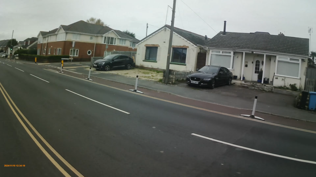 Wimborne Road cycle lane wands (YouTube/DorsetSaferRoads)
