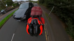 Cyclist films close pass and phone use