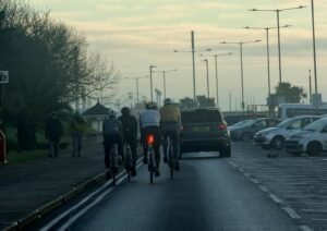Cyclists perfectly legally riding on the road Facebook post