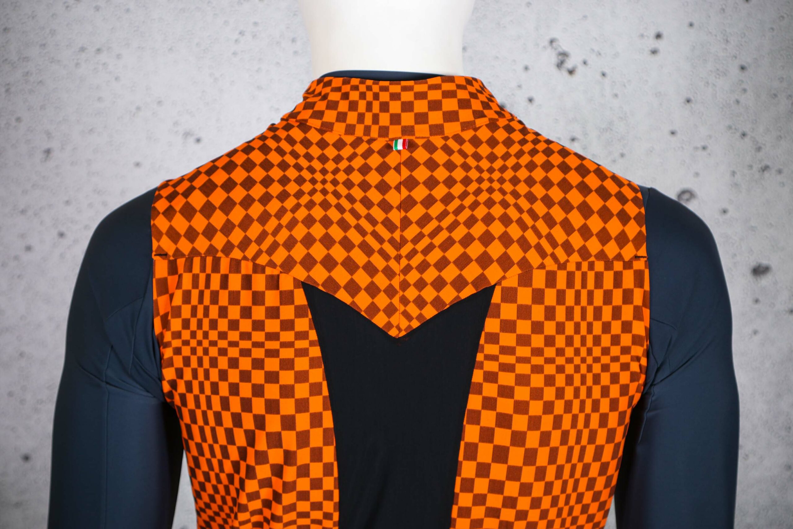 2025-q365-dottore-hybrid-vest-check-orange-shoulders-scaled.jpg