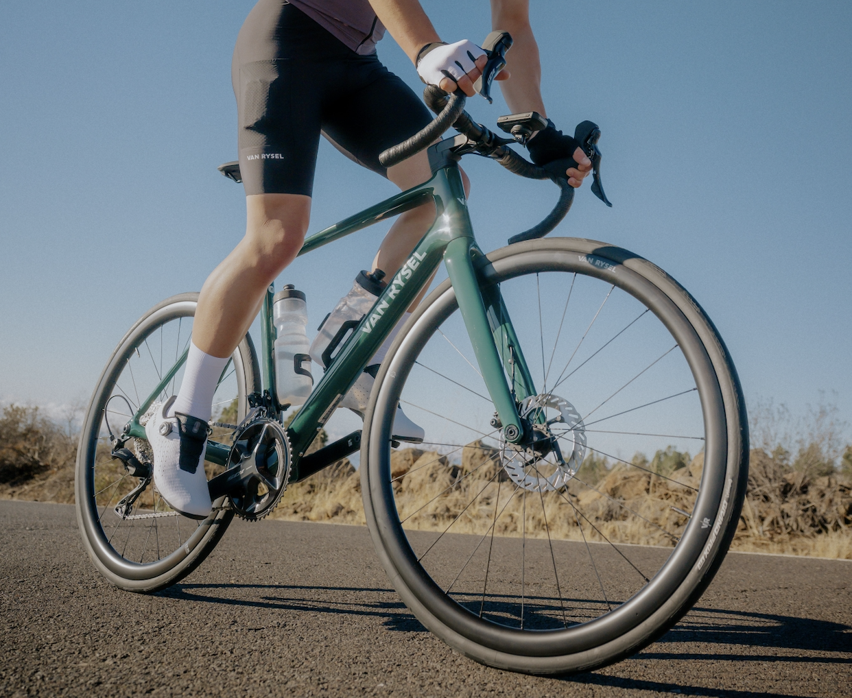Riding shot of green Van Rysel endurance bike