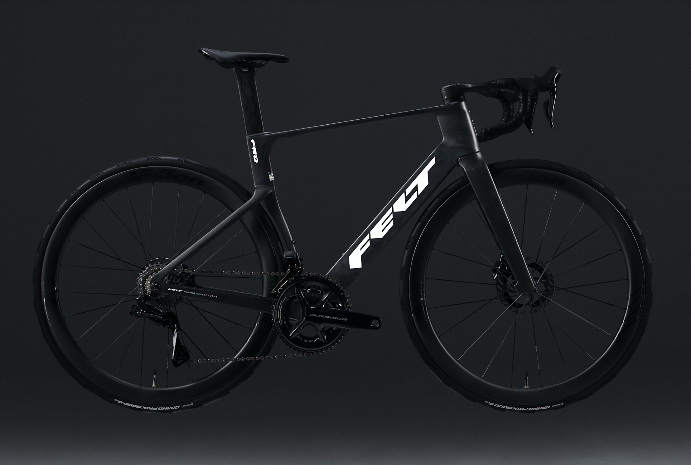 Black Felt road bike on a dark grey background