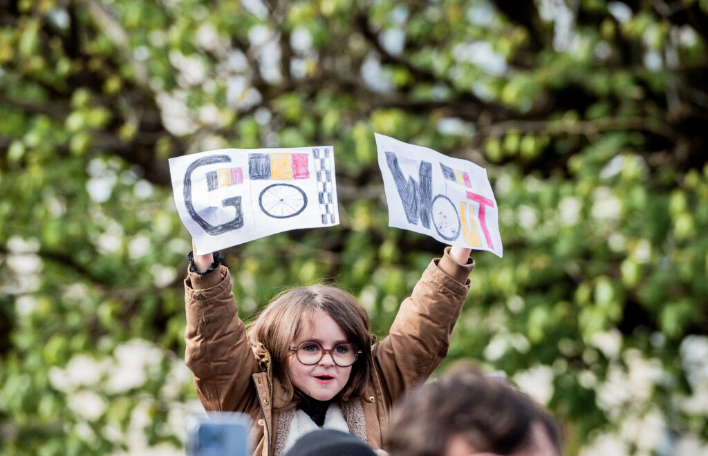 A young fan shows her support for Wout van Aert at the 2026 Paris-Roubaix