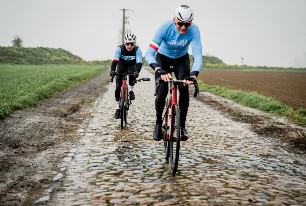 Ryan and Adrie van der Poel on Gruson sector of Paris-Roubaix