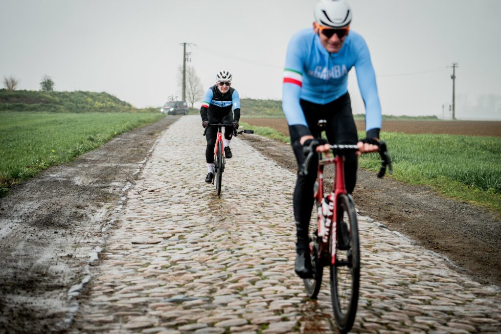 Ryan and Adrie van der Poel on Gruson sector of Paris-Roubaix