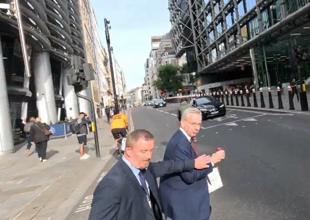 Cyclist almost collides with Michael Gove at crossing 2