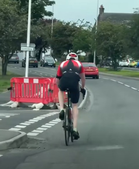 Cyclist riding on road beside Methil cycle lane annoys driver