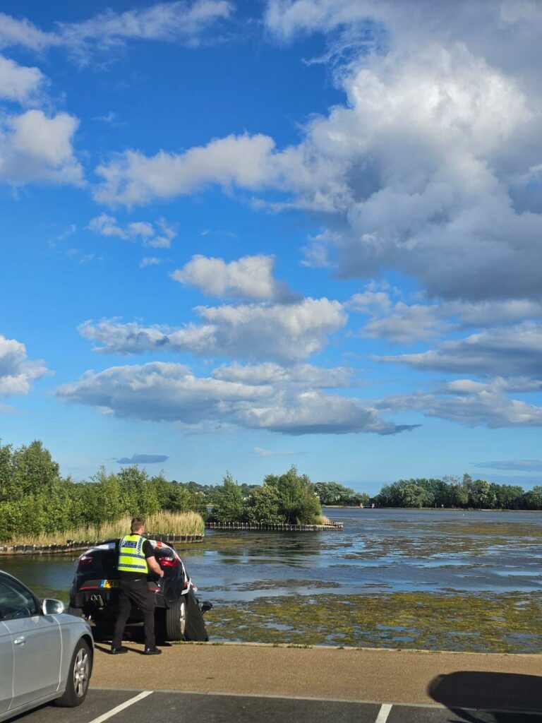 Motorist drives into lake in Poole Park