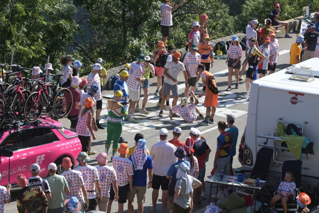 Tour de France fan hit by team car driver in chaotic scenes on Alpe d’Huez, as Movistar rider forced to quit race after slamming into back of UAE vehicle