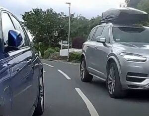 Cyclist fined £1,200 for sqeezing between pasrked car and oncoming driver
