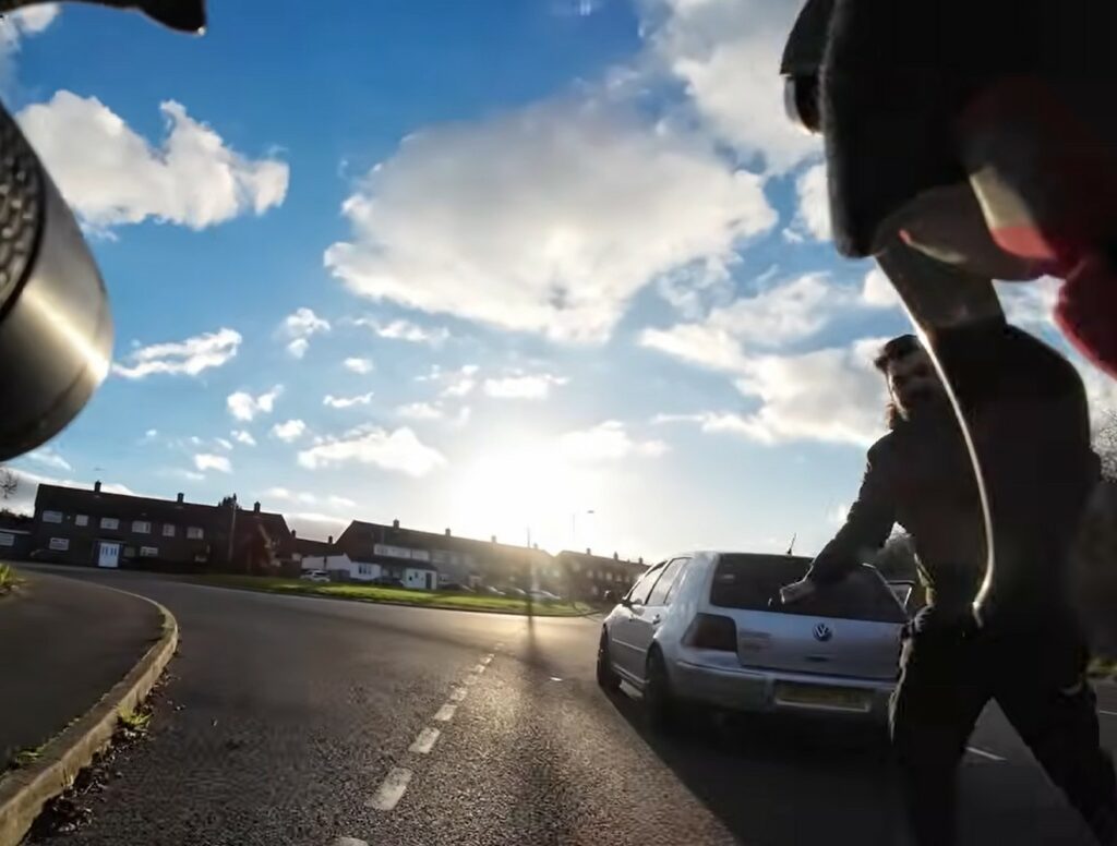 Motorist kicks cyclist in road rage assault after close pass