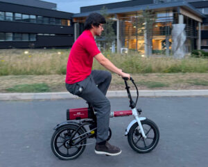 Riding Taisan-powered bike Large
