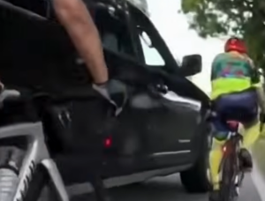 SUV driver veers into cyclist and fires gun in Florida