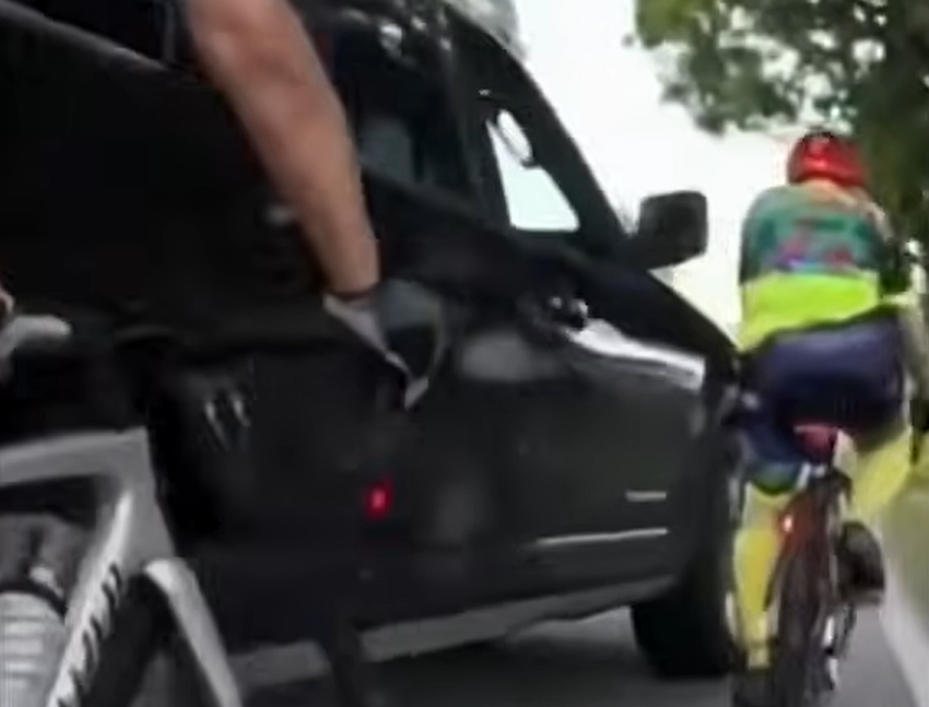 SUV driver arrested after swerving into cyclists and firing gun in shocking US road rage attack