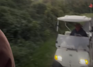Manic golf buggy driver chases cyclist and tries to ram him off trail while shouting “we’re going to go for a ride” in bizarre video + more on the live blog
