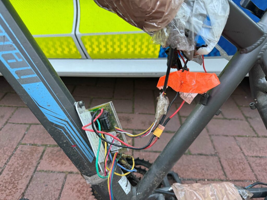 Illegal electric bike-scooter seized by Ashfield Police, wires