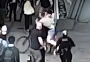 Members of the public tackle bike thief in London