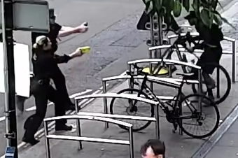 Police approach bike thief in London
